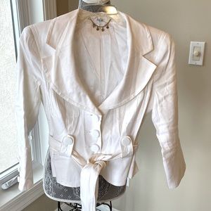 Bebe linen jacket. Jacket is lined. Gorgeous jacket. Belt is trimmed with silk.